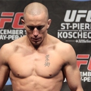 Hoje em uma pausa indeterminada na carreira, Georges St-Pierre não é dos que mais sofre, mas mostra na face o sacrifício do corte de peso - Arte/UOL