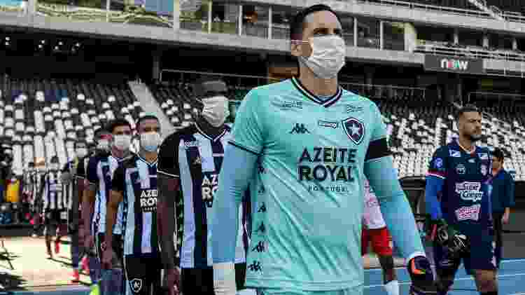 Jogadores do Botafogo protestam pela paralisação do calendário - Thiago Ribeiro/AGIF