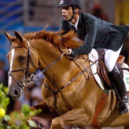 Baloubet du Rouet com cavaleiro Rodrigo Pessoa durante Olimpíadas de 2004