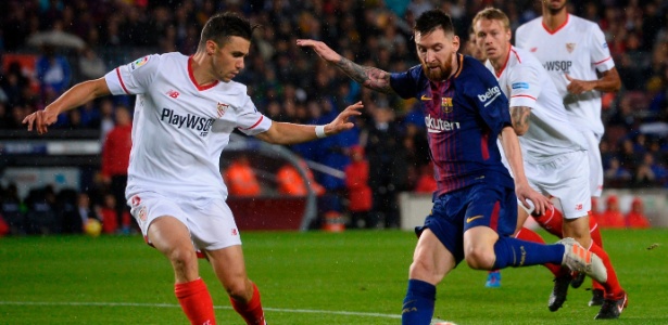 Messi em ação pelo Barcelona durante jogo contra o Sevilla - Josep Lago/AFP
