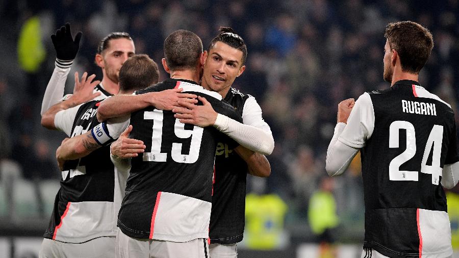 Elenco comemorando o terceiro gol da Juventus sobre a Roma - Soccrates Images / Getty Images