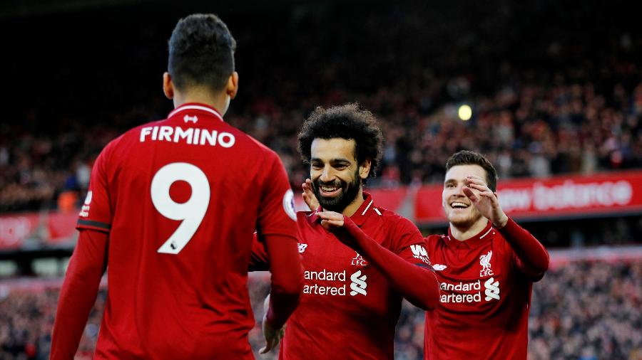 Firmino e Salah comemoram o terceiro gol do Liverpool contra o Bournemouth - REUTERS/Phil Noble 
