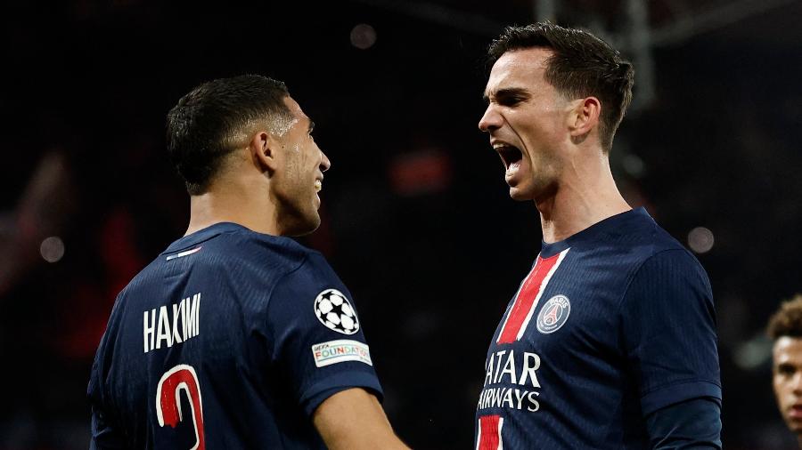 Hakimi e Fabián Ruiz comemoram gol do PSG sobre o Arsenal em duelo da Champions Hakimi e Fabián Ruiz comemoram gol do PSG sobre o Arsenal em duelo da Champions