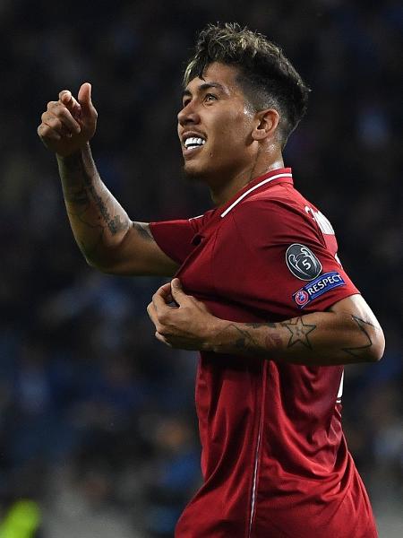 Firmino comemora gol do Liverpool contra o Porto - Paul ELLIS / AFP