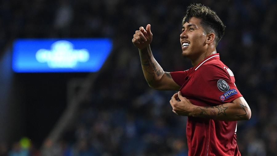 Firmino comemora gol do Liverpool contra o Porto - Paul ELLIS / AFP
