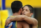 Dupla brasileira sofre, mas vence a segunda no vôlei de praia masculino - HECTOR RETAMAL/AFP