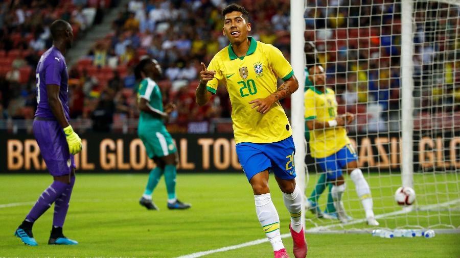 Firmino comemora gol da seleção brasileira sobre Senegal - REUTERS/Feline Lim