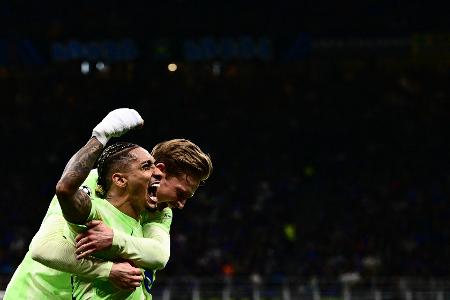 Raphinha, do Barcelona, vibra após marcar contra a Inter de Milão em jogo da Champions League Raphinha, do Barcelona, vibra após marcar contra a Inter de Milão em jogo da Champions League