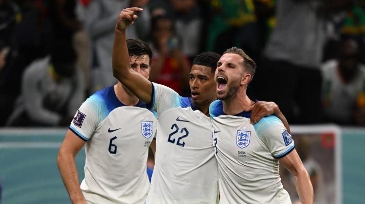 Henderson, Maguire and Bellingham celebrate England's goal against Senegal - Pablo PORCIUNCULA / AFP - Pablo PORCIUNCULA / AFP