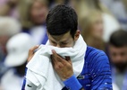 Djokovic volta a sentir dores e abandona US Open com derrota para Wawrinka - Matthew Stockman/Getty Images/AFP 