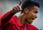 Gênio ou Penaldo? Web se divide após recorde de CR7 - PATRICIA DE MELO MOREIRA/AFP