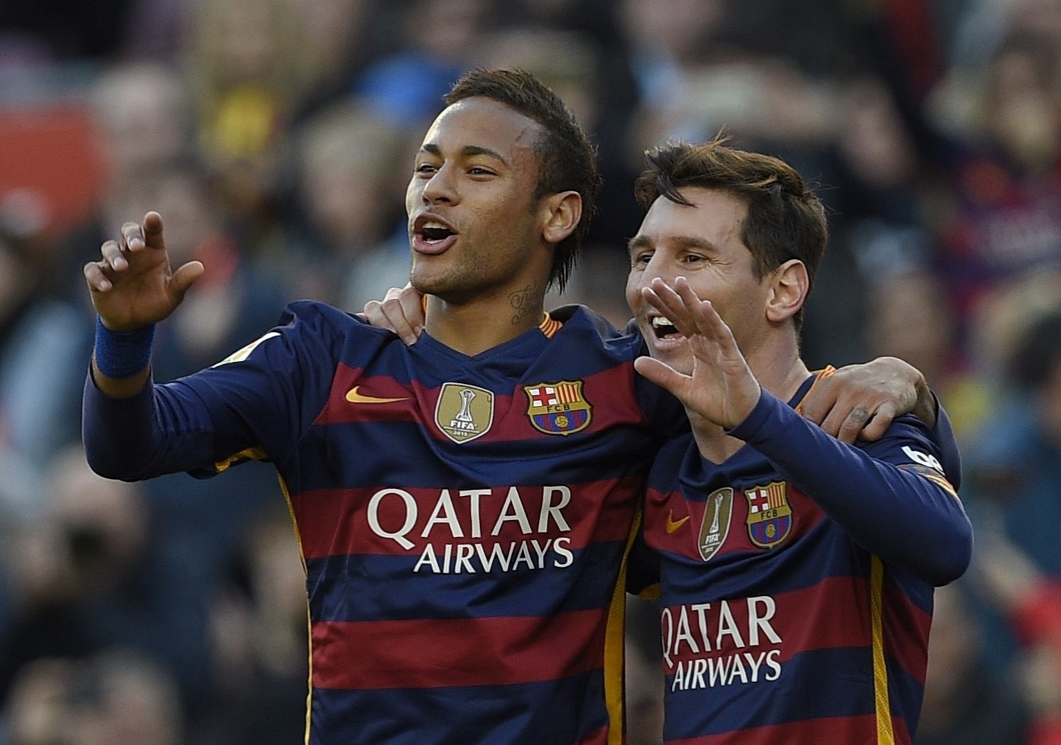 09.jan.2016 - Neymar e Lionel Messi comemoram o gol marcado pelo argentino durante a partida entre Barcelona e Granada pelo Campeonato Espanhol. - LLUIS GENE/AFP