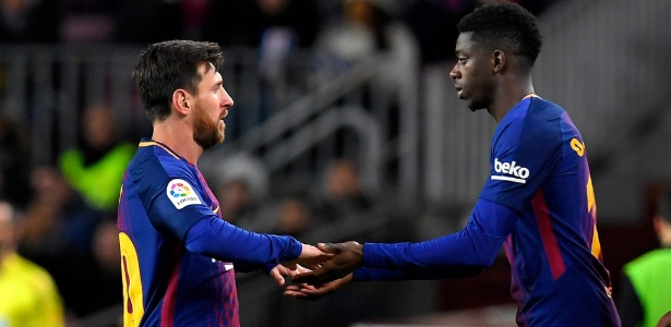 Messi e Dembele - AFP PHOTO / LLUIS GENE - AFP PHOTO / LLUIS GENE