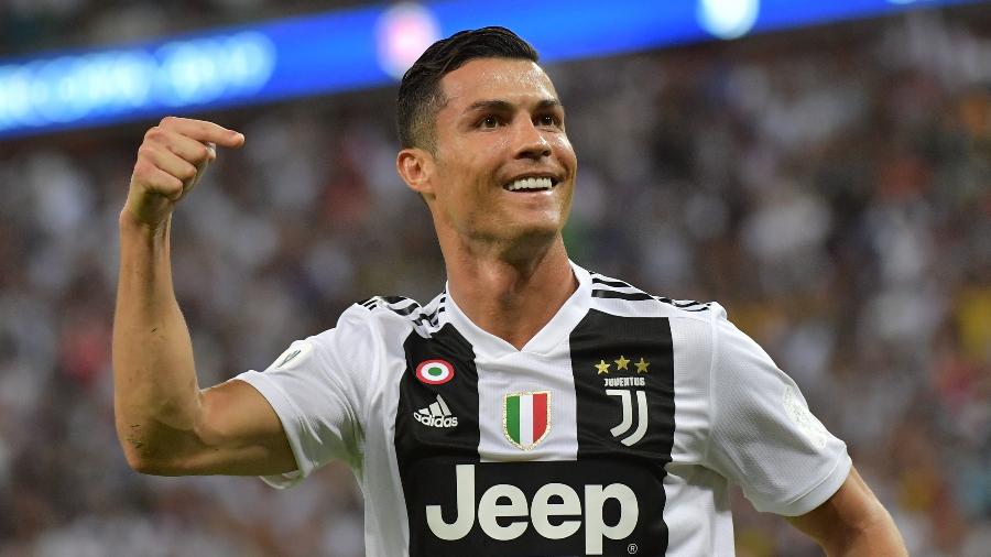 Cristiano Ronaldo comemora após marcar pela Juventus sobre o Milan - Giuseppe Cacace/AFP