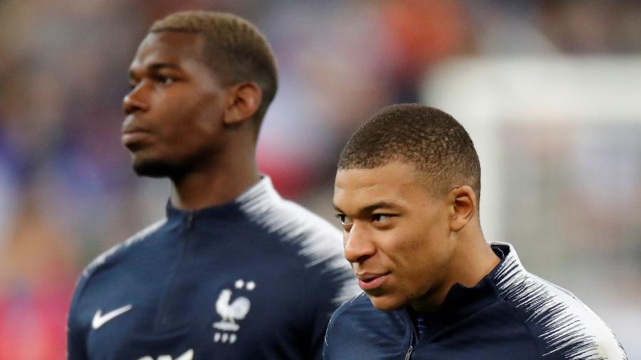 Mbappé e Pogba se aquecem antes de jogo entre França e Islândia - Charles Platiau/Reuters