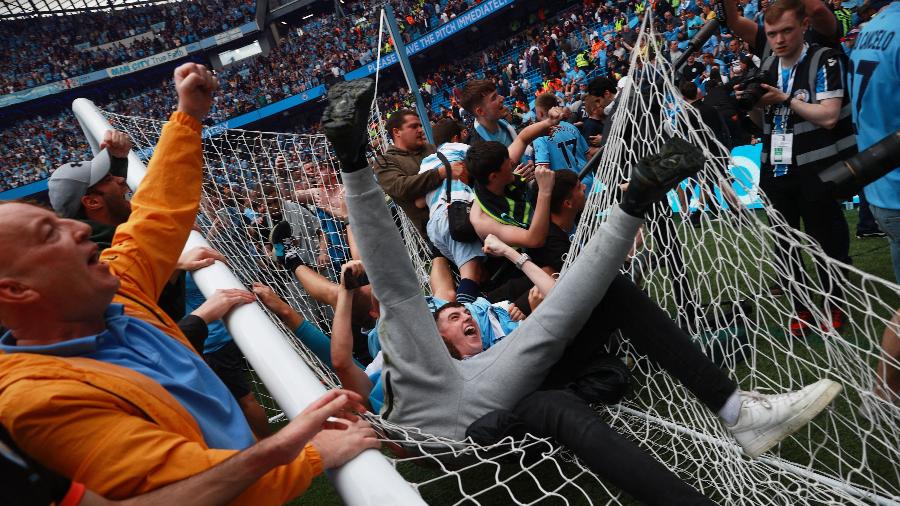 Torcida do Manchester City celebra conquista do Campeonato Inglês - Hannah Mckay/Reuters