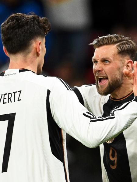 Fullkrug, atacante da Alemanha, comemora com Havertz após marcar no amistoso contra o Peru - Arne Dedert/Getty