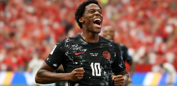 Quem é o canadense que entrou na briga de gigantes pela artilharia da Copa?