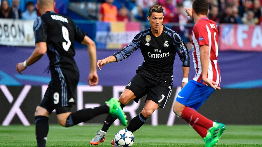 Cristiano Ronaldo em ação pelo Real Madrid contra o Atlético de Madri - Gerard Julien/AFP