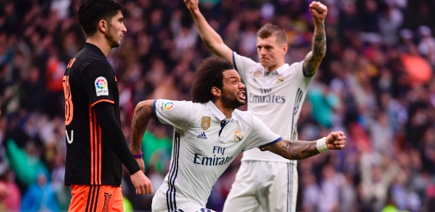 Marcelo comemora o gol da vitória do Real sobre o Valencia - Pierre-Philippe Marcou/AFP Photo