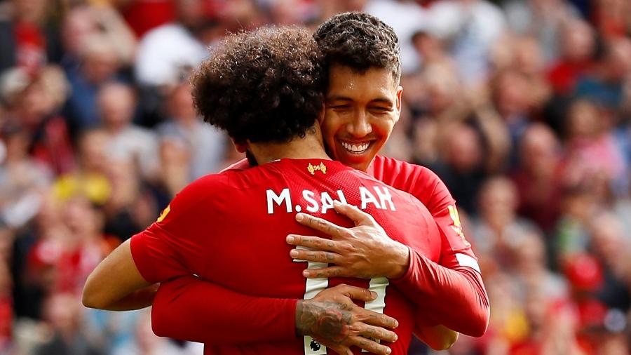 Firmino comemora com Salah gol do Liverpool - Reuters/Jason Cairnduff
