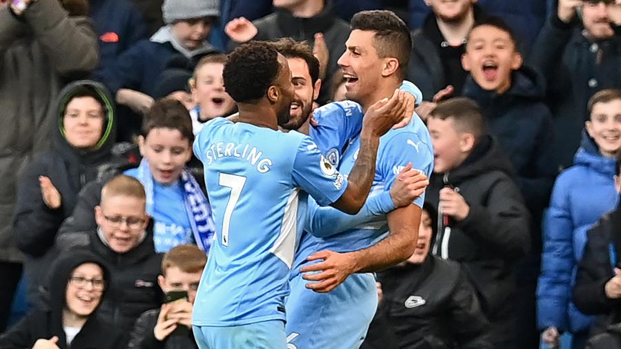 Jogadores do City celebram gol contra o Everton no Inglês - PAUL ELLIS / AFP