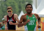 Ainda sem ritmo, brasileiro sofre na corrida é 21º no triatlo após liderar - HECTOR RETAMAL/AFP