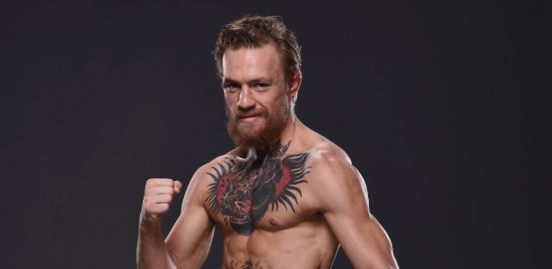 Conor McGregor é o atual campeão interino dos penas do UFC - Getty Images