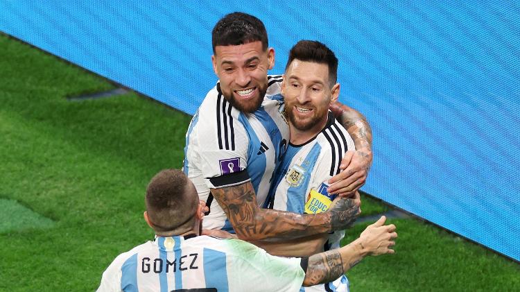 Messi is hugged after scoring for Argentina against Australia in the last 16 of the World Cup - Alexander Hassenstein/Getty Images - Alexander Hassenstein/Getty Images