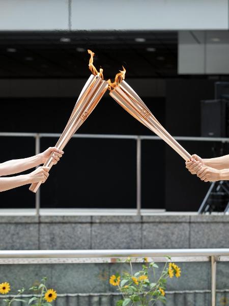 Paris 2024 planeja mudanças no revezamento, com menos tochas distribuídas -  Surto Olímpico