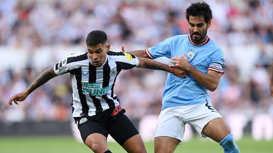 Bruno Guimarães e Gundogan disputam bola durante Newcastle x Manchester City - Stu Forster/Getty Images