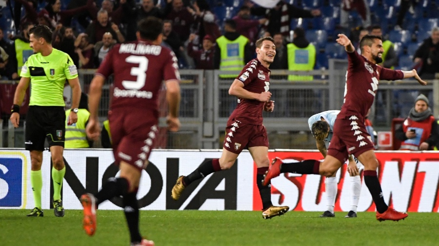 Jogadores do Torino comemoram gol de Rincon contra a Lazio - Andreas Solaro/AFP