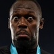Usain Bolt reage ap&oacute;s ver rob&ocirc;s baterem seu recorde: 'S&oacute; me faz rir'