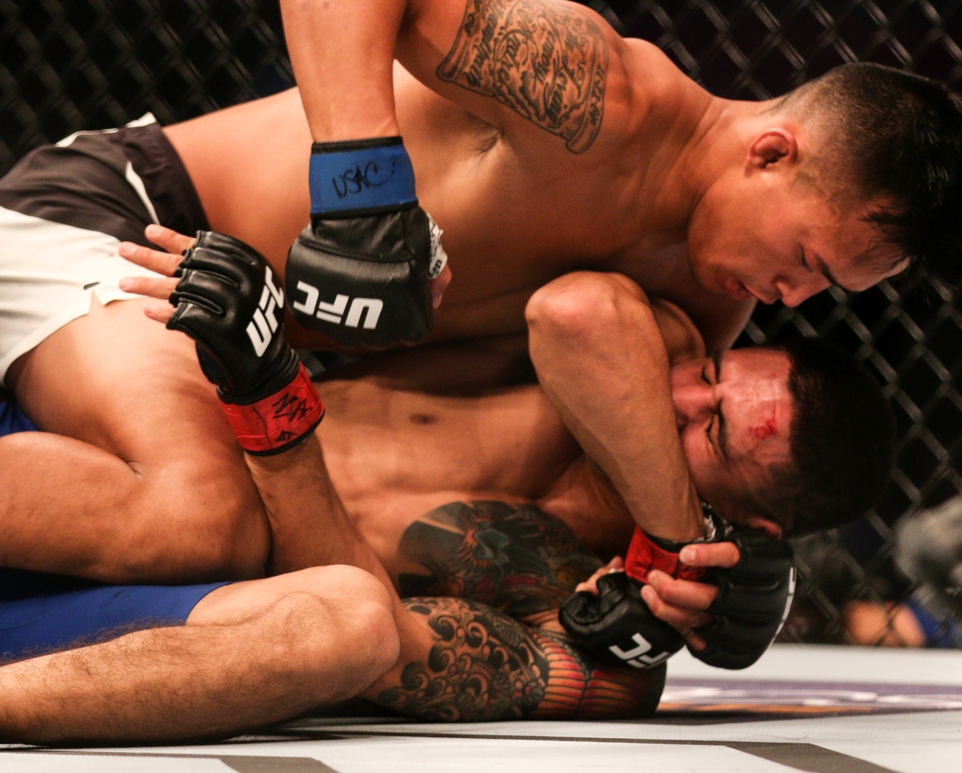 Luta entre o americano Albert Morales e o laosiano Andre Soukhamthath - Rigel Salazar/Ag Fight