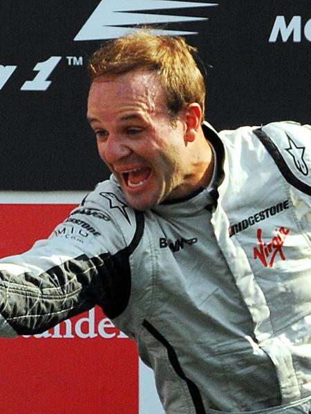 Rubens Barrichello, da equipe Brawn GP, comemora sua vitória no Grande Prêmio de Monza de 2009 - AFP PHOTO / MARIO LAPORTA