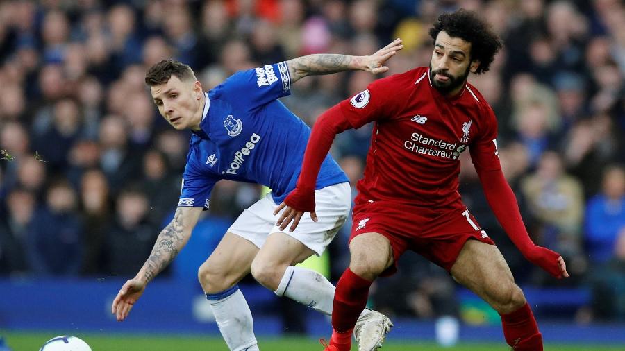 Liverpool e Everton se enfrentarão hoje pelo Campeonato Inglês - Phil Noble/Reuters