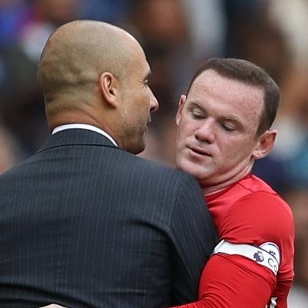 10.set.2016 - Guardiola e Wayne Rooney em clássico entre Manchester United e Manchester City - Phil Noble/Reuters