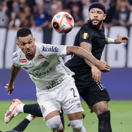 Memphis e Zé Ivaldo em ação durante jogo entre Corinthians e Santos no Paulistão Memphis e Zé Ivaldo em ação durante jogo entre Corinthians e Santos no Paulistão