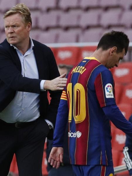 Ronald Koeman, técnico do Barcelona, e Lionel Messi - REUTERS/Albert Gea