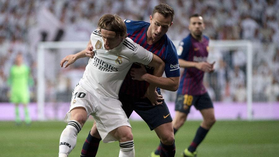 Recuperado de lesão, Arthur voltou a ser titular neste sábado (2), contra o Real Madrid - CURTO DE LA TORRE/AFP