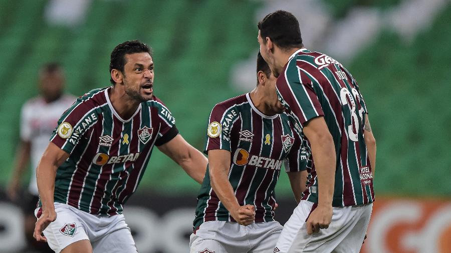 Nino comemora com Fred o primeiro gol do Fluminense contra o São Paulo - Thiago Ribeiro/AGIF