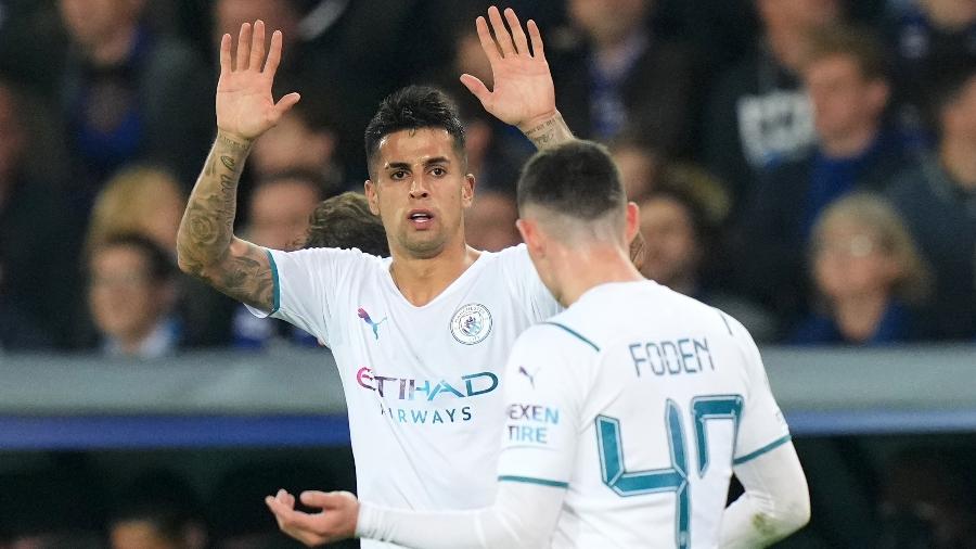 João Cancelo comemora gol do Manchester City sobre o Club Brugge - Matt McNulty/Getty Images