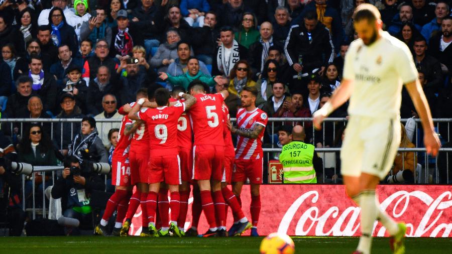 Jogadores do Girona comemoram gol em partida contra o Real Madrid - GABRIEL BOUYS/AFP