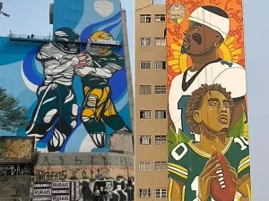 No clima da NFL, artistas de rua criam murais de futebol americano em SP