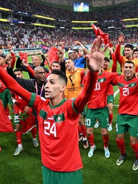 Jogadores do Marrocos celebram classificação para a semifinal da Copa - KIRILL KUDRYAVTSEV / AFP