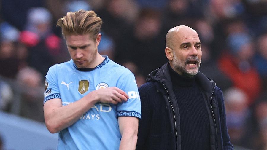 Kevin De Bruyne e Pep Guardiola durante jogo do Manchester City contra o Everton, pelo Inglês Kevin De Bruyne e Pep Guardiola durante jogo do Manchester City contra o Everton, pelo Inglês