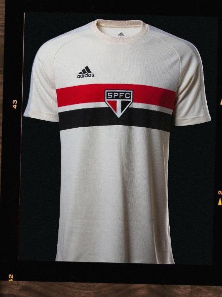 São Paulo e Adidas lançam nova camisa retrô, em tom "cream white", com as listras em preto e vermelho percorrendo todo peito e costas - Reprodução/Twitter