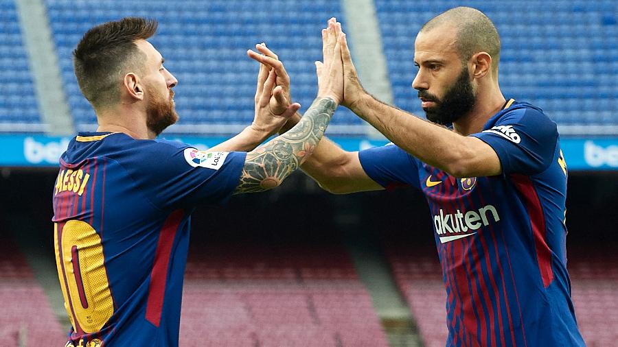 Messi e Mascherano com a camisa do Barcelona - Manuel Queimadelos Alonso/Getty Images