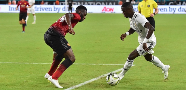 Vinícius Jr. encara a marcação durante amistoso de pré-temporada do Real Madrid - Jasen Vinlove-USA TODAY - Jasen Vinlove-USA TODAY