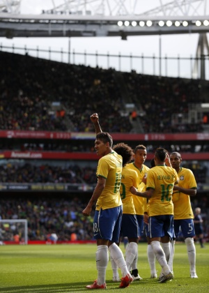 Firmino - AFP PHOTO / ADRIAN DENNIS - AFP PHOTO / ADRIAN DENNIS